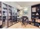 Bright office space featuring hardwood floors, built-in shelving and storage, and an open workspace at 800 N Pearl St # 206, Denver, CO 80203