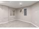 Finished basement with carpet flooring, recessed lighting, and a window for natural light at 8421 E 29Th Ave, Denver, CO 80238