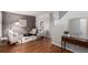 Warm and inviting living room with hardwood floors and neutral walls at 8421 E 29Th Ave, Denver, CO 80238