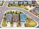 An aerial view of a neighborhood showcasing well-maintained homes, landscaped yards, and community green spaces at 4808 S Picadilly Ct, Aurora, CO 80015