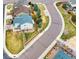 An aerial view of a home with mature trees, manicured lawn, and edging along neighborhood street at 4808 S Picadilly Ct, Aurora, CO 80015