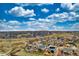 Wide aerial view showcasing the expansive suburban community and open spaces at 4808 S Picadilly Ct, Aurora, CO 80015