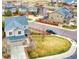 An aerial view of a home with a well-kept lawn, fenced yard, and close proximity to neighborhood amenities at 4808 S Picadilly Ct, Aurora, CO 80015