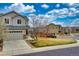 Exterior of a two-story home with attached garage, stone accents, and a well-manicured lawn at 4808 S Picadilly Ct, Aurora, CO 80015