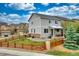 Charming two-story home with a fenced yard, porch, and easy access to outdoors at 4808 S Picadilly Ct, Aurora, CO 80015
