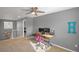 Well-lit office space with an open ceiling, modern desk, and comfortable rolling chair at 4808 S Picadilly Ct, Aurora, CO 80015