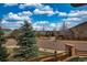 Street view of a charming neighborhood lined with mature trees and well-maintained homes at 4808 S Picadilly Ct, Aurora, CO 80015