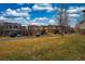 Street view of suburban homes with landscaped yards and attached garages at 4808 S Picadilly Ct, Aurora, CO 80015