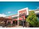 Vibrant exterior of Prost Biergarten featuring a welcoming entrance, outdoor seating, and a lively atmosphere at 1169 Thornbury Pl, Highlands Ranch, CO 80129