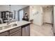 Bright kitchen featuring quartz counters, stainless appliances, and seamless flow into dining area at 3921 E 141St Ave, Thornton, CO 80602
