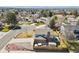 Charming home with a manicured lawn, mature trees, and long driveway in a quiet neighborhood at 3785 E 134Th Ct, Thornton, CO 80241