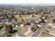 Neighborhood aerial view featuring nearby park with tennis and hockey courts at 3785 E 134Th Ct, Thornton, CO 80241