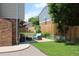 Beautifully landscaped backyard with a patio, lounge seating, and a well-maintained lawn at 3785 E 134Th Ct, Thornton, CO 80241