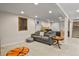 Spacious finished basement featuring neutral colors and room to relax at 3785 E 134Th Ct, Thornton, CO 80241
