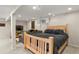 Cozy bedroom featuring a sofa with bed, recessed lighting, and a window for natural light at 3785 E 134Th Ct, Thornton, CO 80241