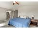Comfortable bedroom with neutral carpet, ensuite bathroom, and ample natural light at 3785 E 134Th Ct, Thornton, CO 80241