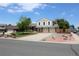 Charming two-story home featuring a well-manicured lawn, brick accents and an attached two-car garage at 3785 E 134Th Ct, Thornton, CO 80241