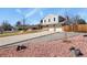 Lovely home with a two-car garage, manicured lawn, and decorative red rock landscaping, perfect for suburban living at 3785 E 134Th Ct, Thornton, CO 80241