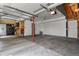 Spacious garage with storage, ample lighting, and access doors for convenience at 3785 E 134Th Ct, Thornton, CO 80241