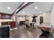 Finished basement features a pool table, bar, fireplace, and laminate wood flooring at 5662 W Peakview Pl, Littleton, CO 80123