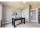 Inviting office space featuring a vaulted ceiling, carpeted floors, and a functional, dark wood desk at 8611 Gold Peak Dr # D, Highlands Ranch, CO 80130