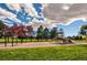 Fun-filled playground area with swings, slides, and climbing structures for children to enjoy at 8611 Gold Peak Dr # D, Highlands Ranch, CO 80130
