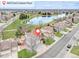Beautiful aerial view of the home, lake, and neighborhood at 18292 E Caspian Pl, Aurora, CO 80013