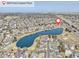 Aerial view of the neighborhood with lake and park nearby in a desirable location at 18292 E Caspian Pl, Aurora, CO 80013
