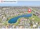 Panoramic aerial view showcases the community, nearby lake, and surrounding landscape at 18292 E Caspian Pl, Aurora, CO 80013