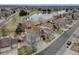 View of a home next to a peaceful lake in a quiet neighborhood at 18292 E Caspian Pl, Aurora, CO 80013