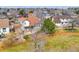 Aerial view of private yard with a pergola, fence and mature trees at 18292 E Caspian Pl, Aurora, CO 80013