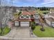 Lovely two-story home with a three car garage, pristine lawn and manicured landscaping at 18292 E Caspian Pl, Aurora, CO 80013