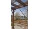View from covered patio overlooking backyard, lake, and walking path at 18292 E Caspian Pl, Aurora, CO 80013