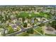 Aerial view of home within a vibrant neighborhood, near a park and local amenities at 7706 S Crocker Ct, Littleton, CO 80120