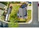 Aerial view of the house showcasing the backyard, shed, patio and landscaping at 7706 S Crocker Ct, Littleton, CO 80120