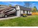 The backyard features a shed with garage door and RV parking, creating extra storage at 7706 S Crocker Ct, Littleton, CO 80120
