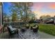 Outdoor deck with wicker furniture, a patterned rug, and a view of the backyard with an RV at 7706 S Crocker Ct, Littleton, CO 80120
