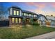 Charming two-story home with brick and Tudor accents, mature landscaping, and attached two-car garage at 7706 S Crocker Ct, Littleton, CO 80120