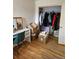 Bedroom with closet and desk area featuring ample storage at 1233 Lansing St, Aurora, CO 80010