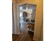 Open living room and dining area with hardwood floors, neutral tones at 1233 Lansing St, Aurora, CO 80010