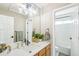 Bright bathroom featuring modern fixtures, a vanity, and a shower at 17158 Cornerstone Dr, Parker, CO 80134