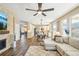 Bright and airy living space showcasing an open layout with kitchen, living, and dining areas at 17158 Cornerstone Dr, Parker, CO 80134