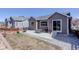 Cozy backyard featuring a patio, BBQ, picnic table, and landscaped rocks for outdoor enjoyment at 17718 Leisure Lake Dr, Monument, CO 80132