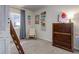 Charming bedroom with cozy chair, shelving unit, dresser and decorative wall art, creating a warm and inviting space at 17718 Leisure Lake Dr, Monument, CO 80132