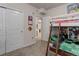 Shared bedroom with playful bunkbeds, closet space, and bright decor at 17718 Leisure Lake Dr, Monument, CO 80132