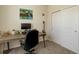 Bedroom with a window, light walls, desk, computer and closet at 17718 Leisure Lake Dr, Monument, CO 80132