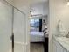 Main bathroom with tiled walk-in shower and granite countertops at 17718 Leisure Lake Dr, Monument, CO 80132