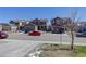 Residential street showcasing well-kept homes, parked cars, and a pleasant neighborhood atmosphere at 17718 Leisure Lake Dr, Monument, CO 80132