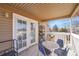 Relaxing outdoor balcony with seating, perfect for enjoying serene views and fresh air at 5011 Troy St, Denver, CO 80239