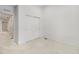 Bedroom with sliding closet doors and ample space at 9757 Ash Ln, Thornton, CO 80229